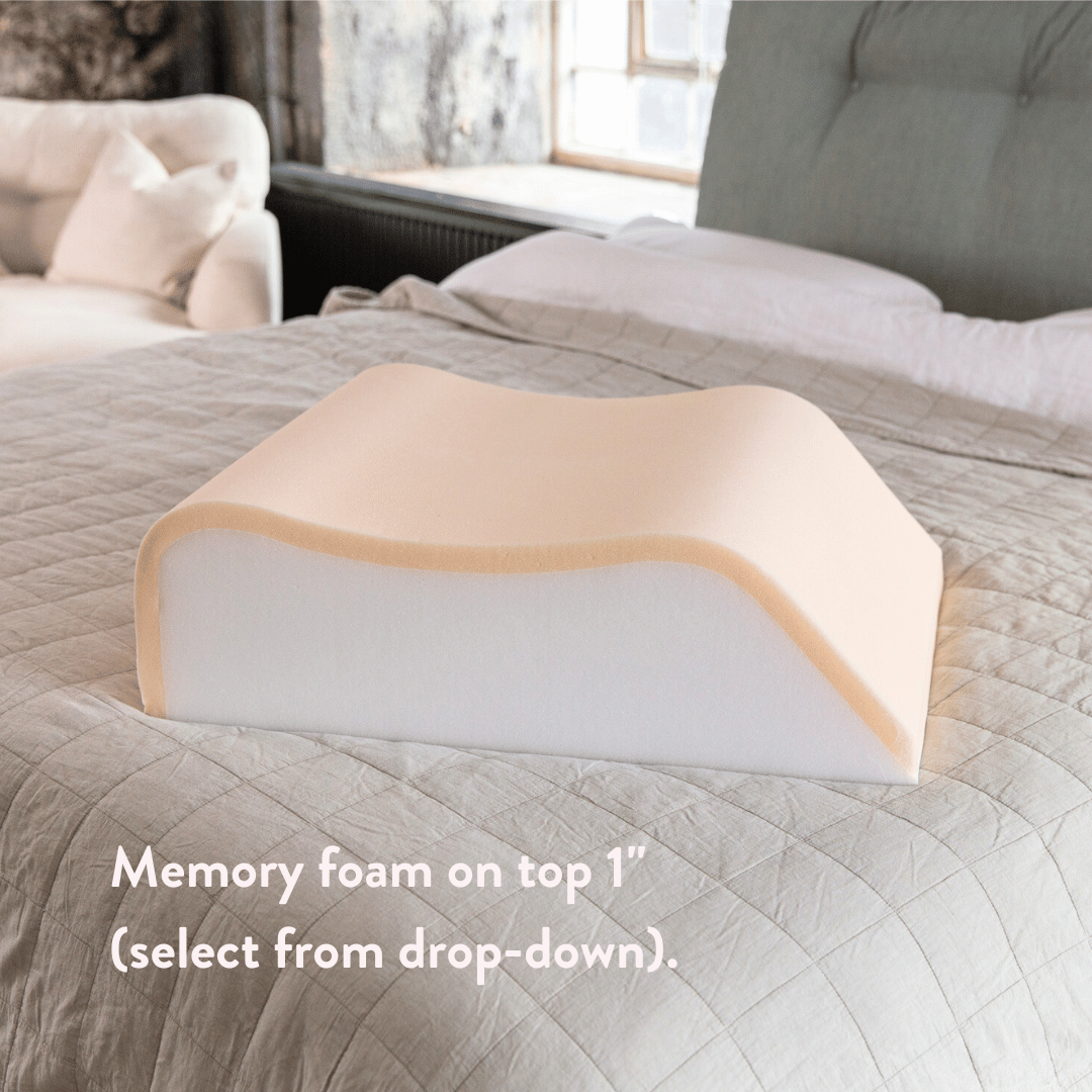 Putnams contoured leg rest pillow on a bed (image 5)