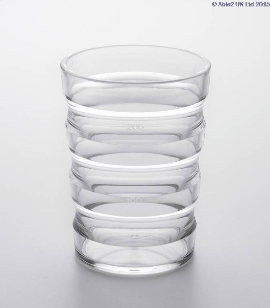 Clear Sure Grip cup with grooved sides and spout lid