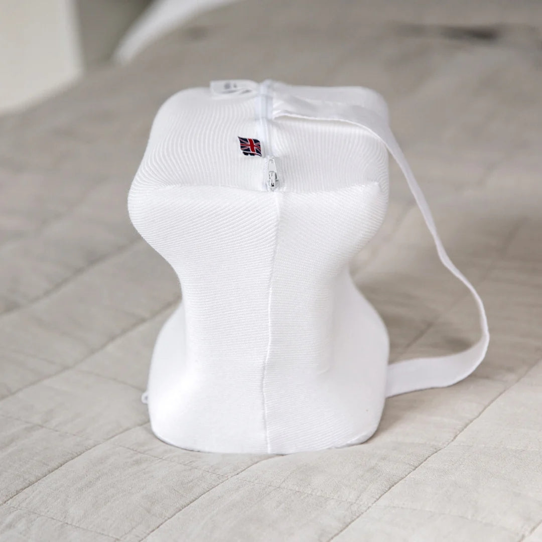 Putnams knee pillow with cotton cover and adjustable strap